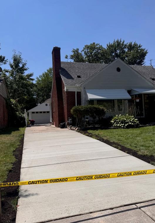 Full driveway replacement, curb to garage — concrete work by Loaded Construction in metro Detroit