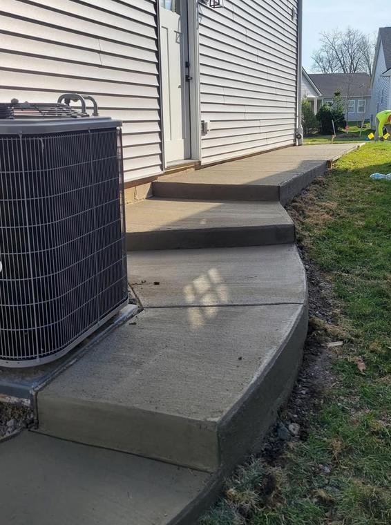 Radius walkway and cast steps — concrete work by Loaded Construction in metro Detroit